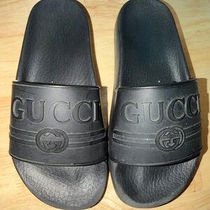 Gucci Black Embossed Logo Rubber Slide Sandals